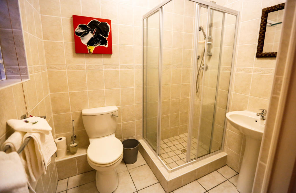 Secret Garden Guesthouse Bloubergstrand Δωμάτιο φωτογραφία